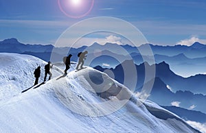 Mountaineering group on snowy peak