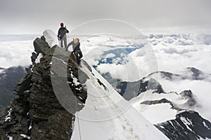 Mountaineers roped up on the glacier