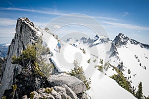 Mountaineers on a snowy peak.