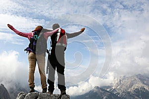 Mountaineers on top of a mountain photo