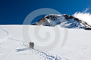 Mountaineers walking on Monte Rosa Glacier