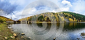Mountainous autumn river bank in the Urals