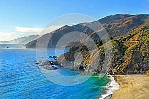 Mountainous coast of California at a viewpoint along the US1 Big Sur Coastal Highway. View of the Pacific ocoan with turquoise photo