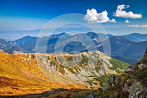 Mountainous landscape with hills and valleys in autumn season