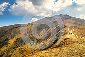 Mountainous landscape with hills and valleys in autumn season