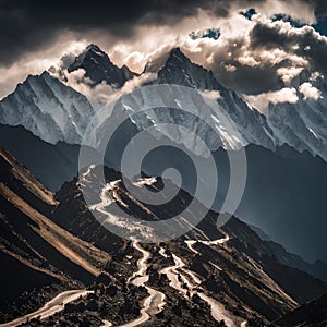 A mountainous landscape with a winding road.