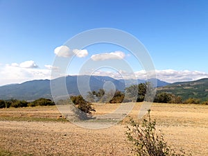 mountainous terrain with blue sky