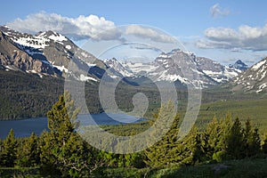 Mountains above Lower Two Medicine Lake near Glacier National Park in Montana photo