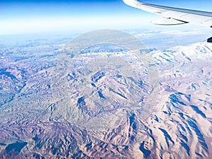 Mountains in the airplane window