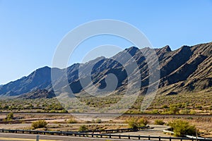 Mountains along desert and blue sky in the landscape of Arizona, USA