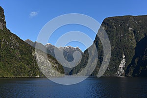 Mountains along the fiord of Doubtful Sound in Fiordland National Park in New Zealand