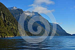 Mountains along the fiord of Doubtful Sound in Fiordland National Park in New Zealand