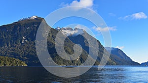 Mountains along the fiord of Doubtful Sound in Fiordland National Park in New Zealand