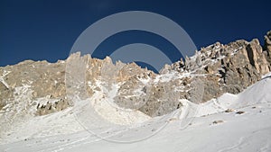 Mountains in Alps in Italy durring sunny day durring skiing photo
