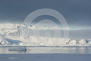 Mountains of the Antarctic Peninsula covered with stratus clouds