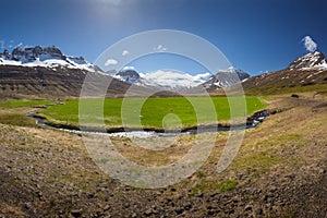 Mountains around pastures in idyllic Eastern Iceland