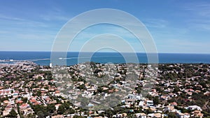 Mountains and city and sea drone view Denia Spain