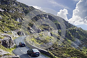 Mountains and cliff road traffic at the conor pas