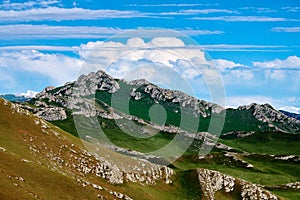 The mountains and clouds in summer Bayanbulak grassland scenic spot