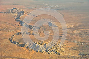 Mountains, desert, settlement. photo