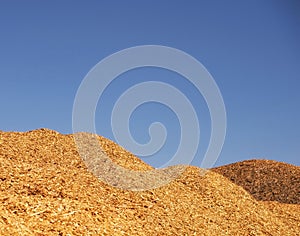 Mountains dry industrial chips under the open sky