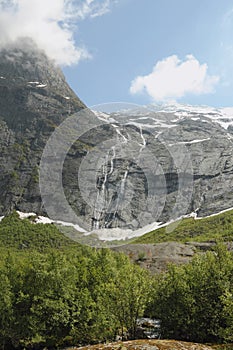 Mountains and falls from glacier. Olden, Norway