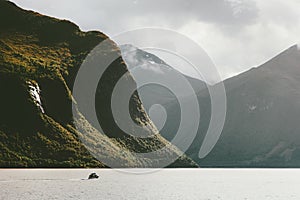 Mountains and fishing boat fjord sea