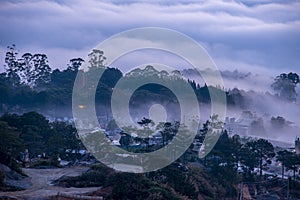 Mountains in fog at beautiful morning in autumn in Dalat city, Vietnam.