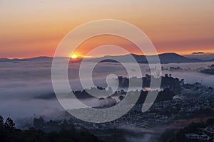 Mountains in fog at beautiful morning in autumn in Dalat city, Vietnam.