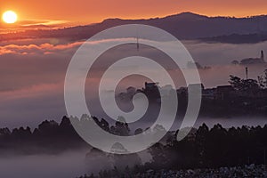 Mountains in fog at beautiful morning in autumn in Dalat city, Vietnam.