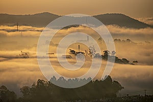 Mountains in fog at beautiful morning in autumn in Dalat city, Vietnam.