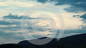 Mountains forest landscape under evening amazing epic blue sky with clouds in sunlight at spring day. Nature inspiration concept