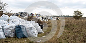 Mountains of garbage in bags
