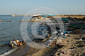 Mountains of garbage on the beach away from the resort towns