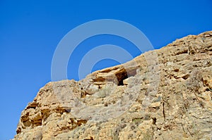 Mountains and gorge Judean desert. Hot, scorching sun and blue sky