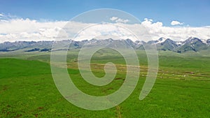 Mountains and grassland in a sunny day