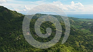 Mountains and hills with green vegetation.