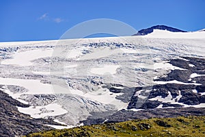 Mountains with ice glacier. Road Sognefjellet, Norway