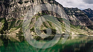 Mountains and lake against a cloudy sky. Gunib district of Dagestan