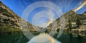 Mountains and lake sited in the Pirineos photo