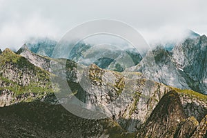 Mountains Landscape from Hermannsdalstinden summit in Norway foggy scandinavian