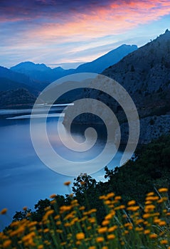 Mountains landscape with lake in twilight