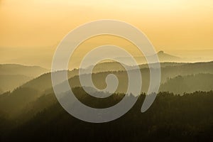 Mountains landscape layers in fog, Saxon-Bohemian Switzerland, Czech republic