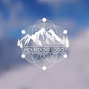 Mountains lodo. Emblem with stylized mountain landscape for design. photo