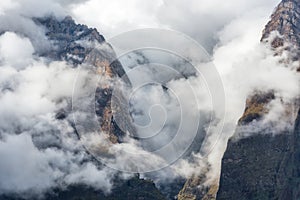 Mountains in low clouds in the evening in Nepal