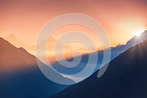 Mountains and low clouds at sunrise in Nepal