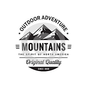 Mountains outdoor adventure - concept logo badge for t-shirt clothing. Original quality. Retro vintage style. Fashion graphic