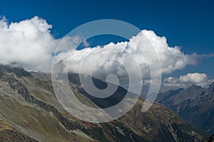 Mountains and peaks landscape. Stubaier Gletscher covered with glaciers and snow, natural environment.