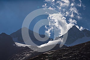 Mountains and peaks landscape. Stubaier Gletscher covered with glaciers and snow, natural environment.