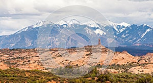 Mountains and red rocks on the horizon landscape in the Arches National Park, Utah, USA